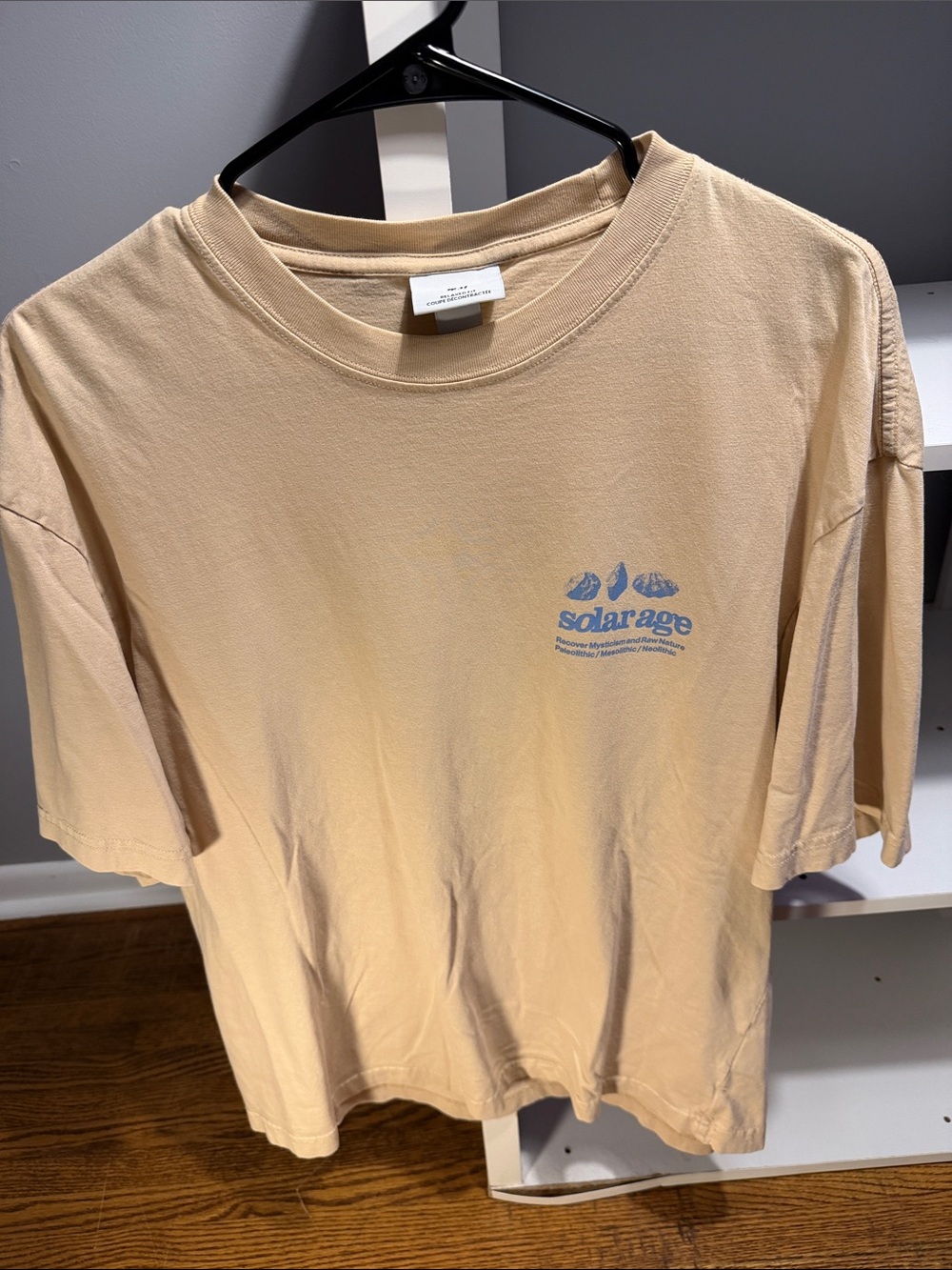 H&M Beige Short Sleeve Tee with Blue 'solarage' Logo